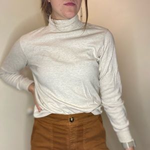 Off White Turtle Neck Long Sleeve Top